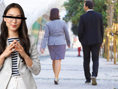Portrait of gorgeous caucasian woman in stylish elegant clothes and make up looking away with crossed arms against kissing couple in the street. Cheating concept. Third wheel.