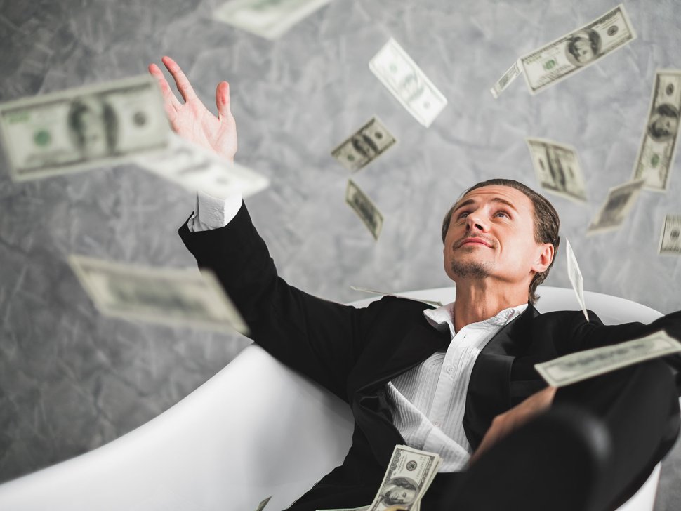 rich-man-money-bathtub-0402211